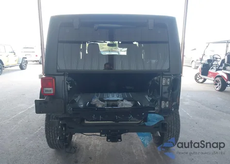 2015 Jeep Wrangler Unlimited Sahara z USA, uszkodzony, nr VIN 1C4BJWEG1FL654415